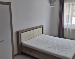 Apartament cu doua dormitoare, parcare proprie, mobilat si utliat